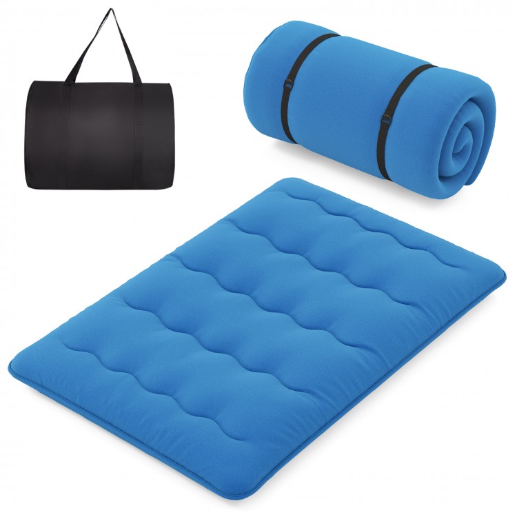 Blue foldable futon mattress with washable cover and carry bag, ideal for camping and versatile floor use.