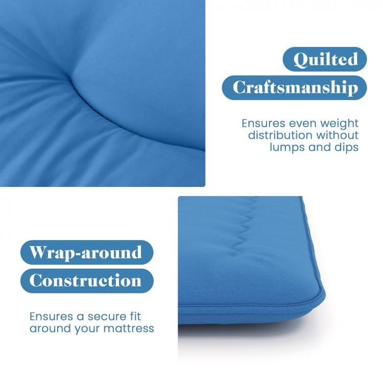 Quilted blue foldable futon mattress with wrap-around construction, perfect for camping and easy storage.