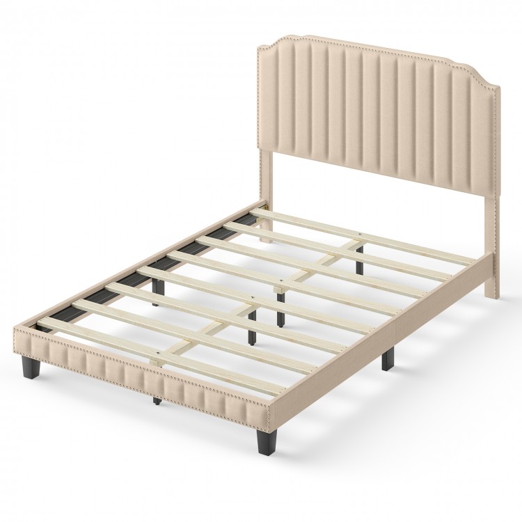 Beige heavy-duty upholstered bed frame with rivet headboard and wood slats for full-size bedding, enhancing room decor.