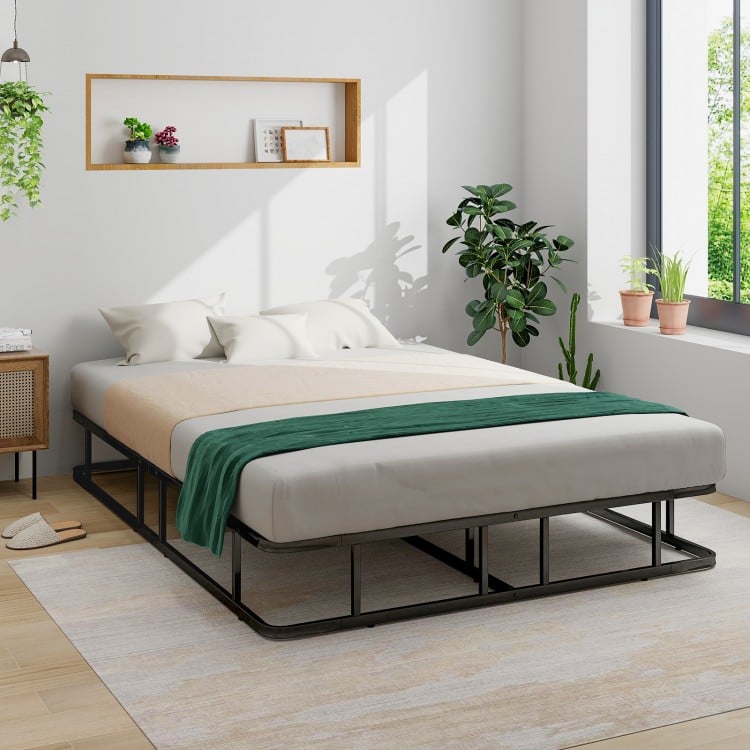 Queen size bed frame with a modern design, showcasing a sleek profile and spacious layout for contemporary bedrooms.