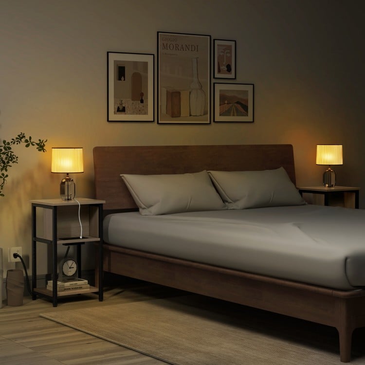 3-tier end table with USB ports and power outlets, featuring a metal frame, ideal for bedside or living room use.
