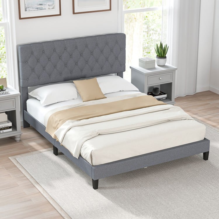 Queen size upholstered platform bed with gray tufted headboard, perfect for modern bedrooms and guest rooms.