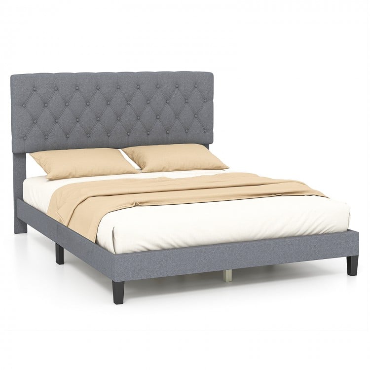 Queen size upholstered platform bed in gray with button tufted headboard, designed for comfort and modern style.