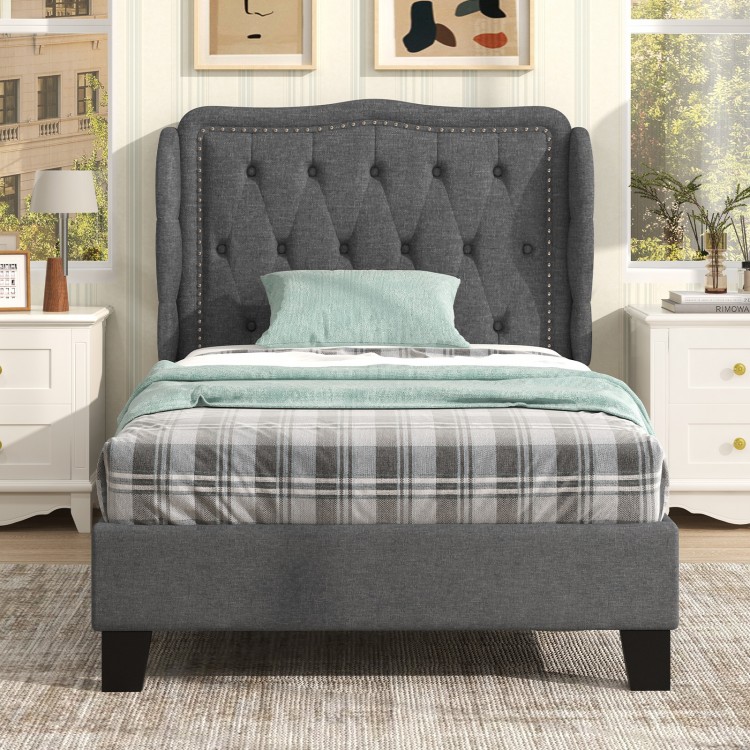 Twin size bed frame with button tufted wingback headboard in gray, featuring under-bed storage and sturdy plywood slats.