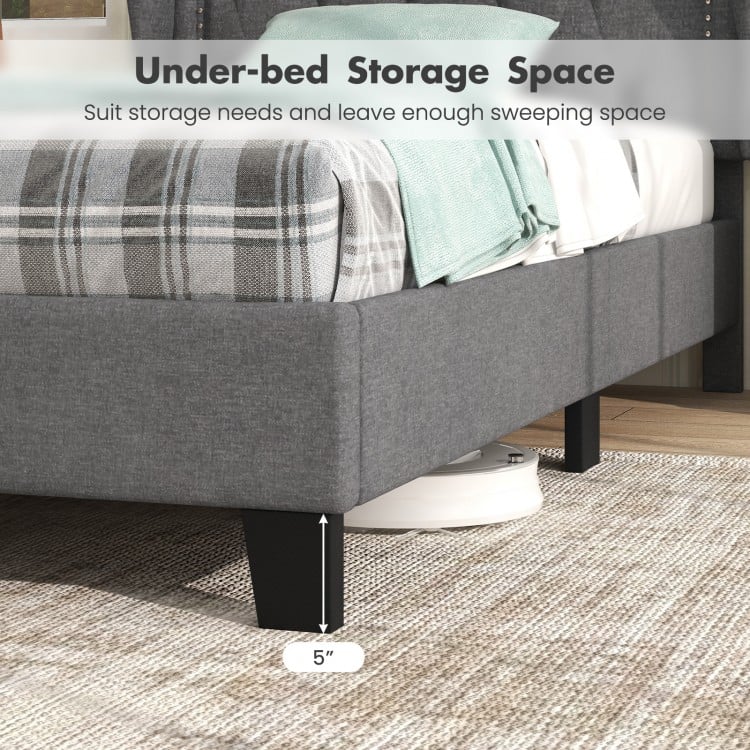 Twin size bed frame with gray upholstery, button tufted headboard, and 5" under-bed storage space for organization.