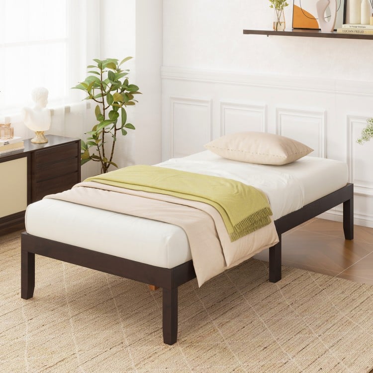 Twin wood platform bed frame in espresso with sturdy slats, minimalist design, and ample under-bed storage space.