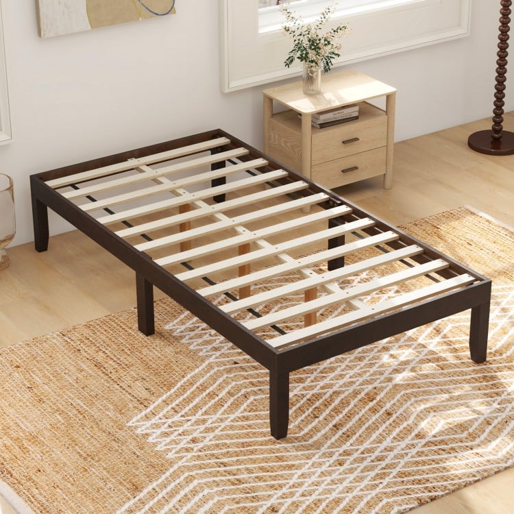 Twin wood platform bed frame in espresso with sturdy slats and ample under-bed storage for minimalist home decor.
