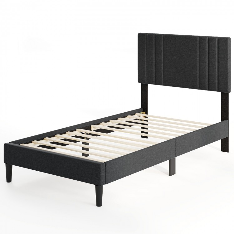 Twin size bed frame with vertical channel tufted headboard, faux linen fabric, and wooden slats for mattress support.