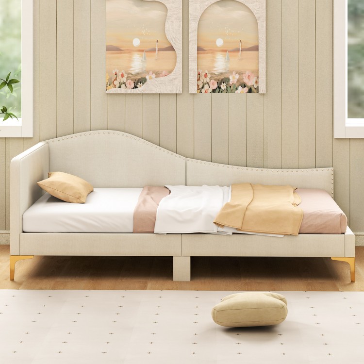 Upholstered twin size daybed in breathable linen with rivet design, perfect for versatile use as a sofa or bed.