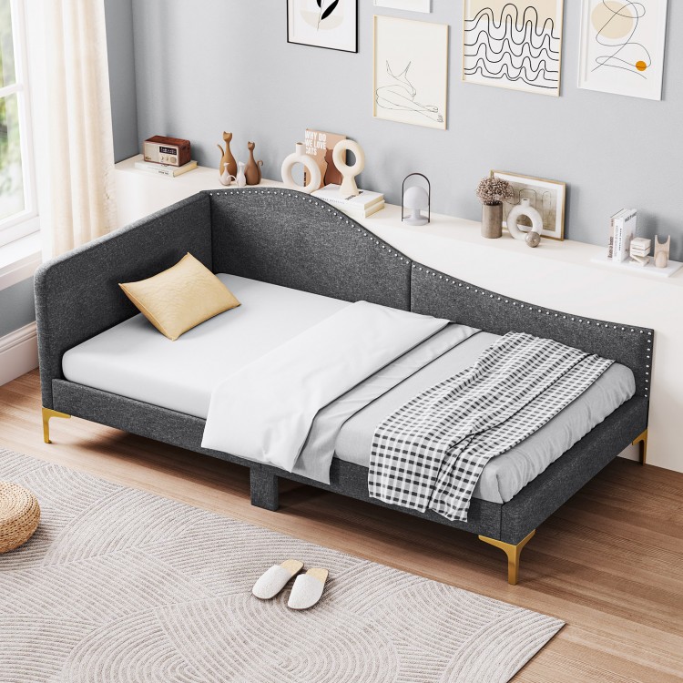 Gray linen platform bed featuring a delicate rivet design and wood slats, perfect for a stylish daybed or sofa setup.