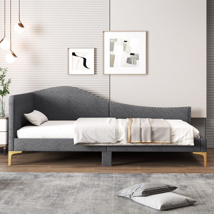 Rivet-tufted twin size platform bed in gray linen with metal legs, ideal as a daybed or sofa for versatile use.
