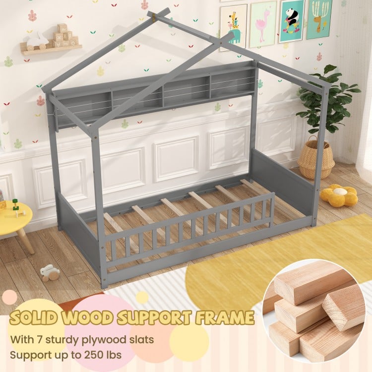 Twin size house bed in gray with storage shelf, solid wood frame, and safety guardrails for secure sleeping.