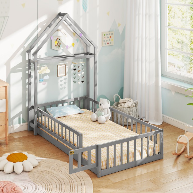 Twin size house floor bed in gray with house-shaped headboard, low-to-ground design for easy access and safety features.