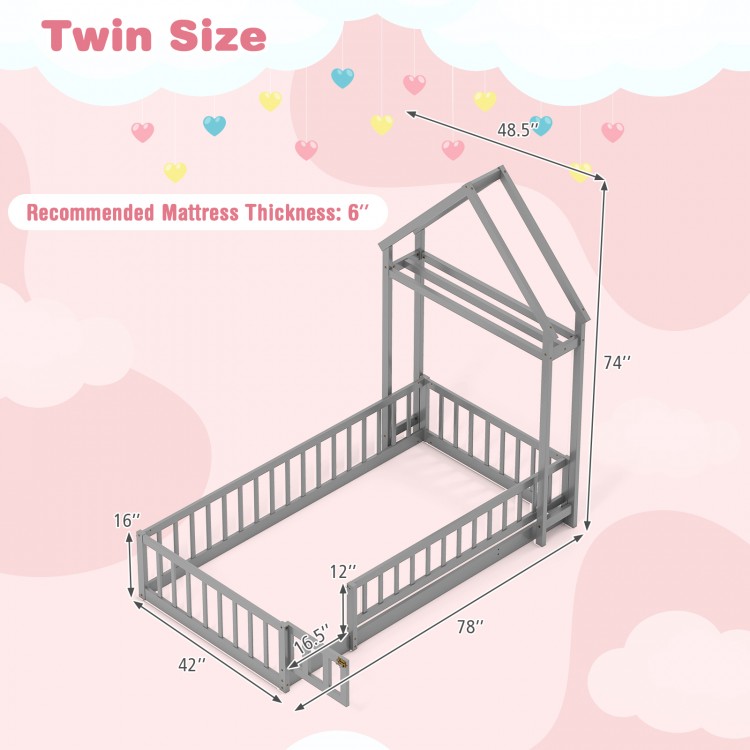 Twin size house floor bed in gray with house-shaped headboard, low-to-ground design, and secure guardrails for kids.
