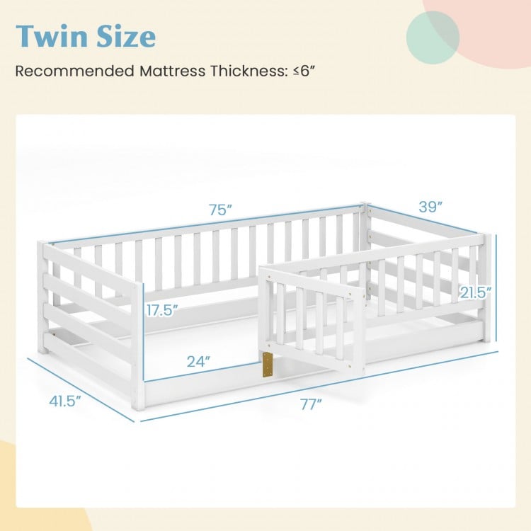 Twin size floor bed with high fence and door, crafted from sturdy pine wood for kids' safety and independence.