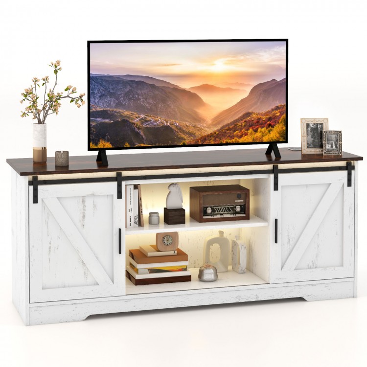 White TV stand with sliding doors, adjustable shelves, and LED lighting for 65-inch TVs, perfect for living room decor.