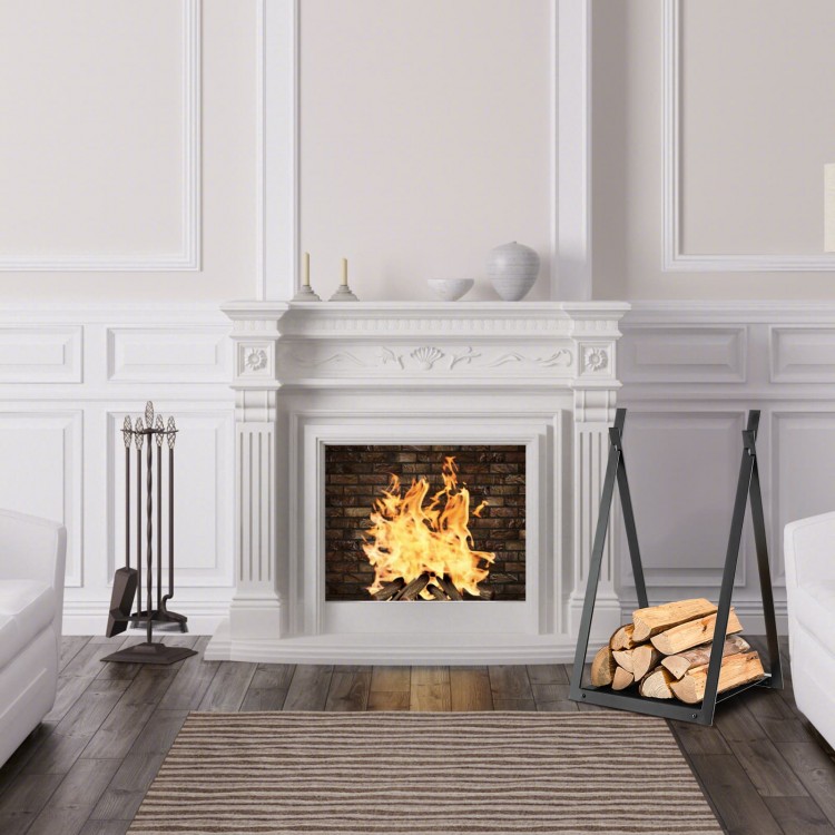 Triangle firewood rack in black with raised base, holding firewood near a fireplace for indoor and outdoor use.