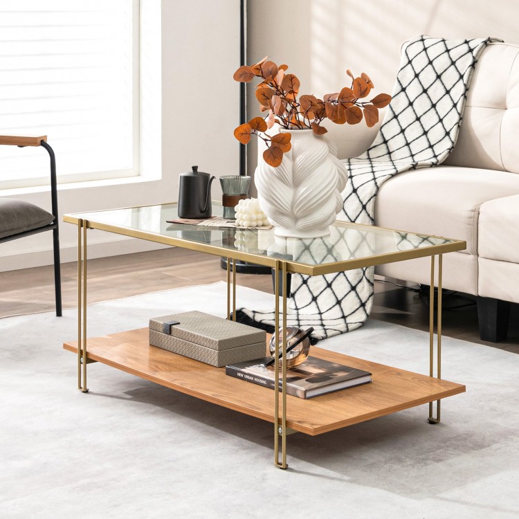 Rectangle glass coffee table with gold steel frame and wooden shelf, featuring a modern design for versatile living.