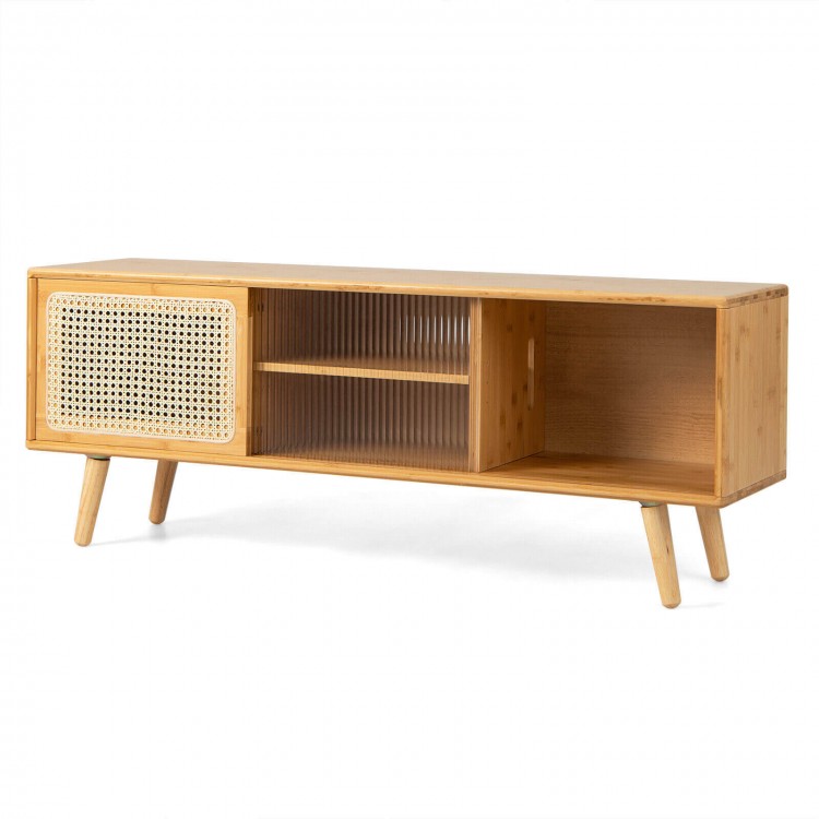 Modern TV stand in natural bamboo with rattan sliding doors and adjustable shelf for stylish storage and organization.