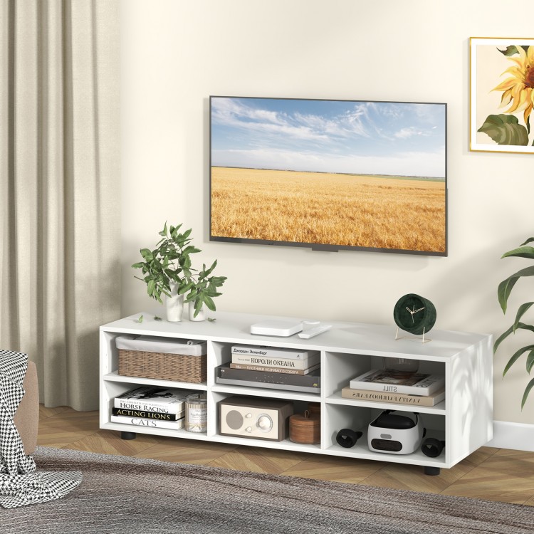 Spacious white TV stand with elegant design, showcasing 6 open cubbies and cable management for organized living spaces.