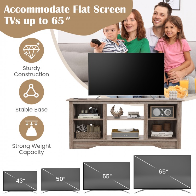 Gray TV stand for up to 65" flat screen TVs with adjustable shelves, ideal for storage and modern home aesthetics.