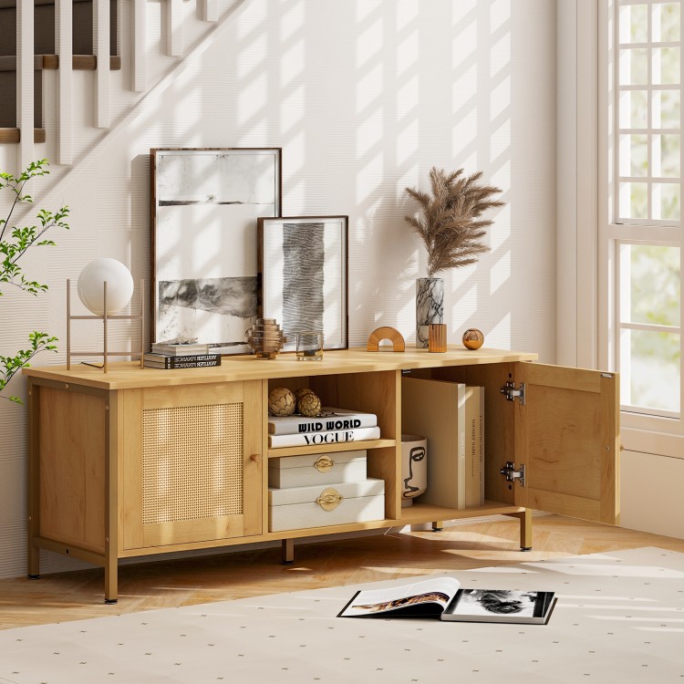 Boho TV stand with faux rattan doors, spacious for TVs up to 55 inches, featuring open shelves and side storage.