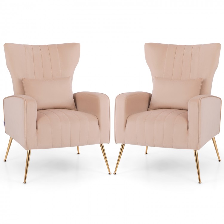 Pair of pink velvet upholstered wingback chairs with lumbar pillows and golden metal legs, perfect for living rooms.