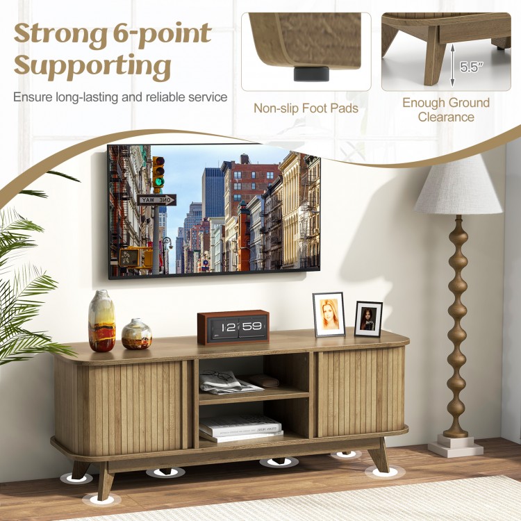 TV stand in oak finish with dual sliding doors, adjustable shelves, and non-slip foot pads for stable support.