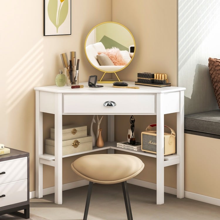 Corner wooden laptop desk in white with a drawer and two shelves, ideal for study or office use.