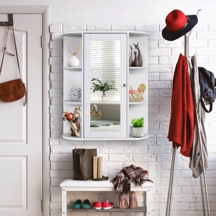 Wall-mounted white bathroom cabinet with a single door, six open shelves, and mirror for organized storage.