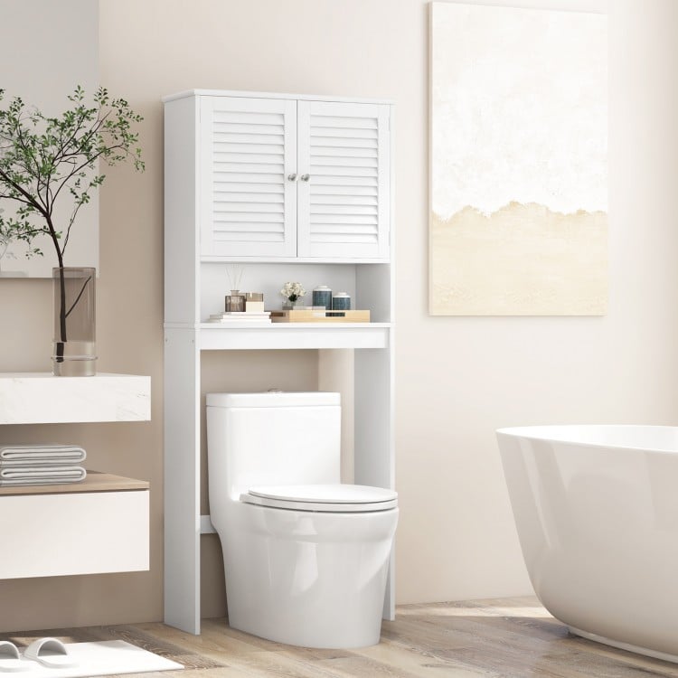 Over the toilet storage cabinet with double doors and adjustable shelf, maximizing bathroom space with a modern design.