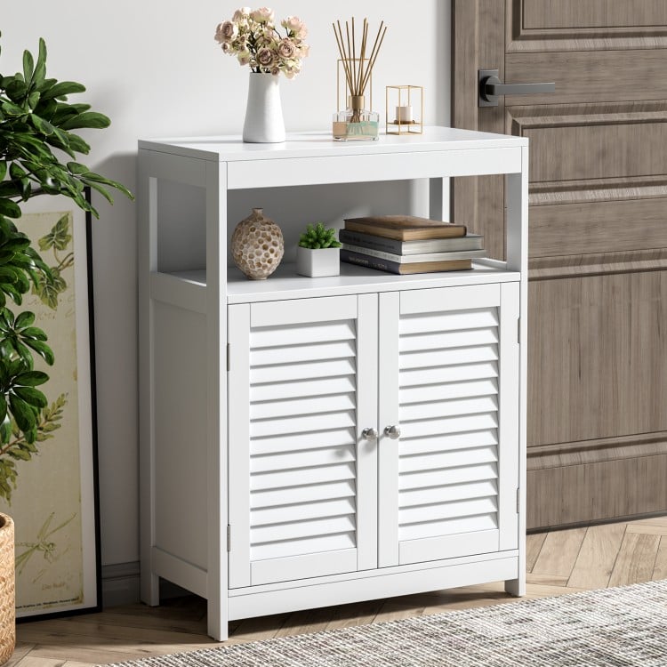 Freestanding white bathroom cabinet with double shutter doors and adjustable shelf for versatile storage solutions.