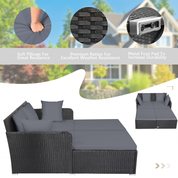 Spacious outdoor rattan daybed in gray with upholstered cushions, designed for comfort and durability, perfect for.