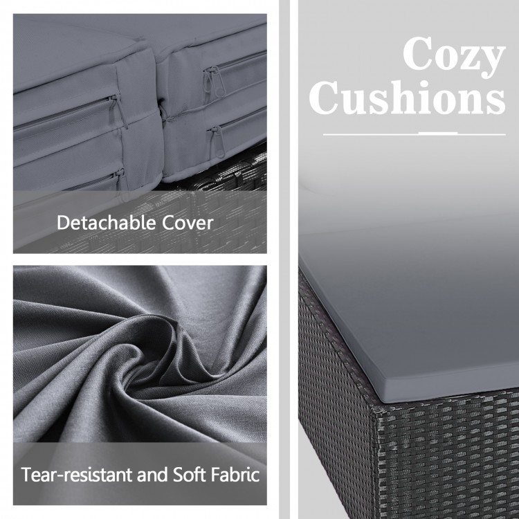 Cozy gray cushions with detachable covers on a spacious outdoor rattan daybed, featuring tear-resistant fabric.