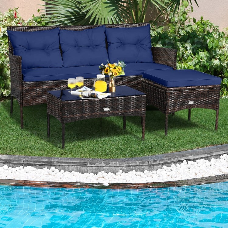 3-piece patio furniture sectional set with navy cushions, featuring a coffee table and all-weather rattan for outdoor.