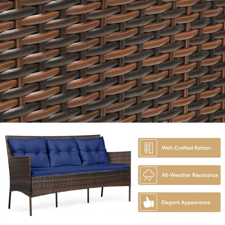 Close-up of well-crafted rattan texture in a 3-piece patio furniture sectional set with navy cushions for outdoor.
