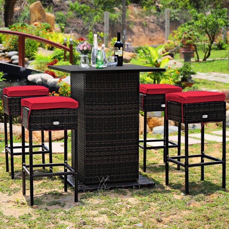 5-piece patio rattan bar set with cushioned red stools and hidden storage, perfect for outdoor leisure at poolside or.