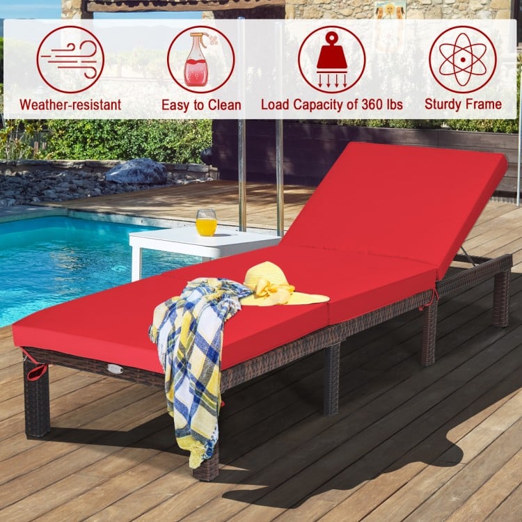 Red outdoor rattan adjustable cushioned chaise lounge with sturdy steel frame, ideal for patio and poolside relaxation.