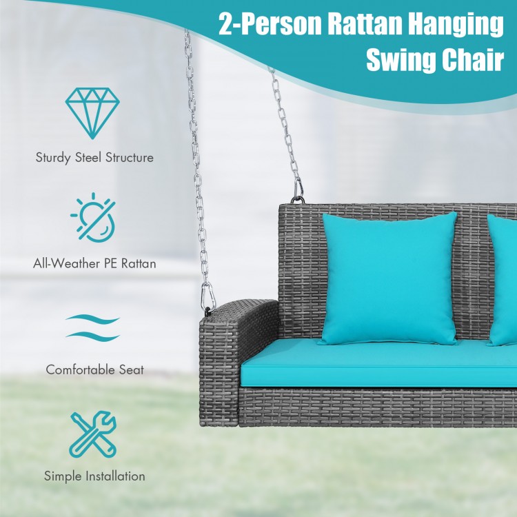 2-person hanging swing chair with turquoise cushions, made of all-weather PE rattan, suitable for outdoor relaxation.
