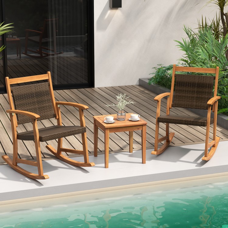 Acacia wood patio rocking chair set with side table, featuring weather-resistant wicker, perfect for outdoor relaxation.