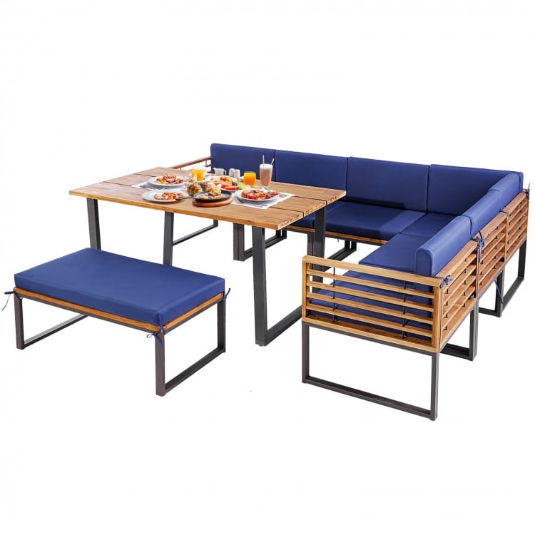 8-piece patio dining set featuring acacia wood table, navy cushions, and versatile ottoman for outdoor relaxation.