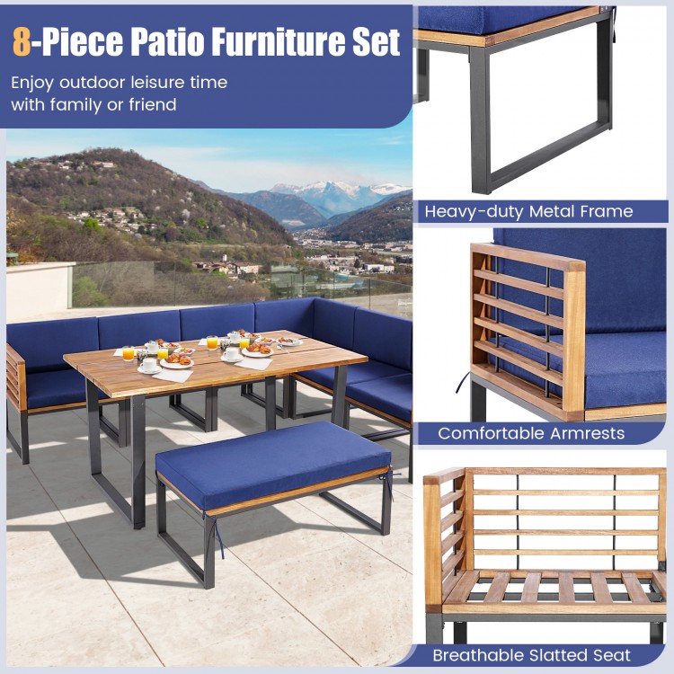 8-piece patio dining set featuring acacia wood, navy cushions, and heavy-duty metal frame for outdoor relaxation.