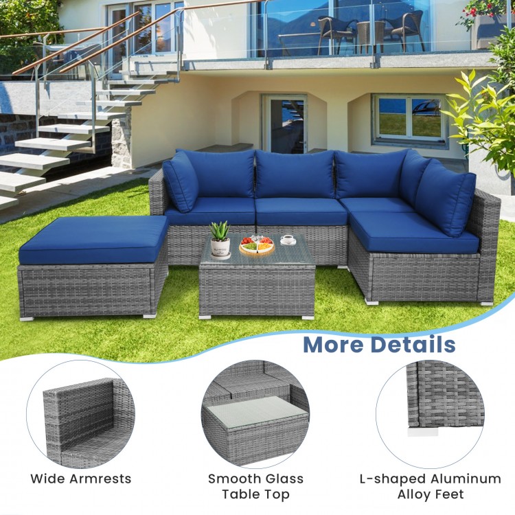 L-shaped outdoor rattan sofa set with navy cushions, featuring a coffee table and sturdy steel frame for patio.