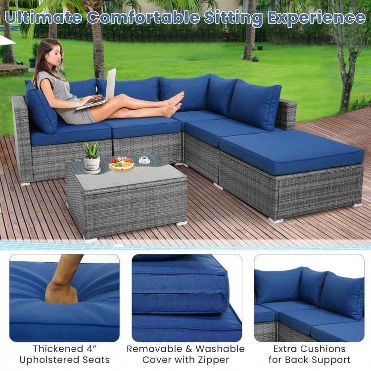 L-shaped 6-piece outdoor rattan sofa set with navy cushions, ideal for patio or garden relaxation.