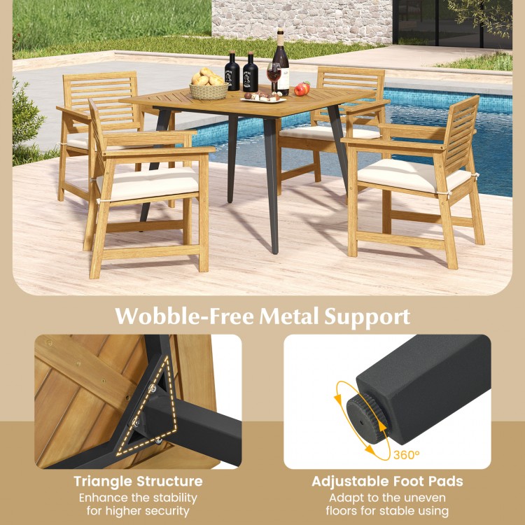 Acacia wood outdoor dining table for 4 with wobble-free metal support, ideal for garden and poolside use.