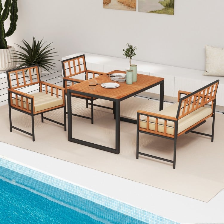 4-piece acacia wood patio dining set featuring a rectangular table and cushioned chairs, perfect for outdoor dining.