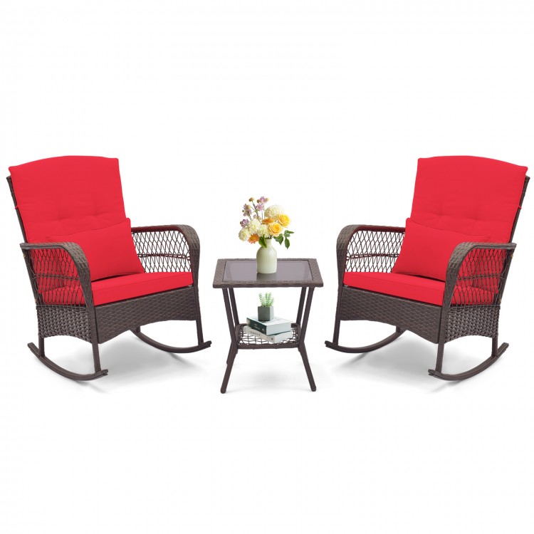 Two red cushioned rocking chairs with a 2-tier coffee table, perfect for backyard or poolside relaxation.