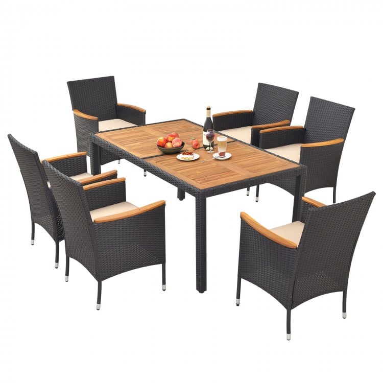 7-piece outdoor dining set featuring acacia wood tabletop, padded cushions, and umbrella hole for backyard gatherings.