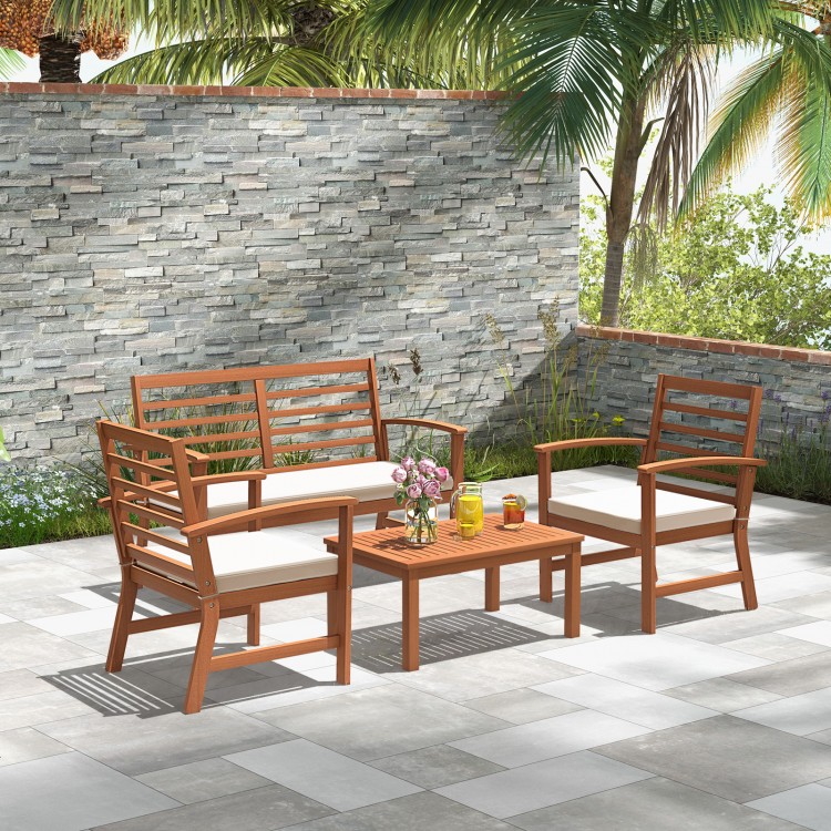 Front view of the 4-piece outdoor furniture set, highlighting the natural acacia wood finish and detachable beige.