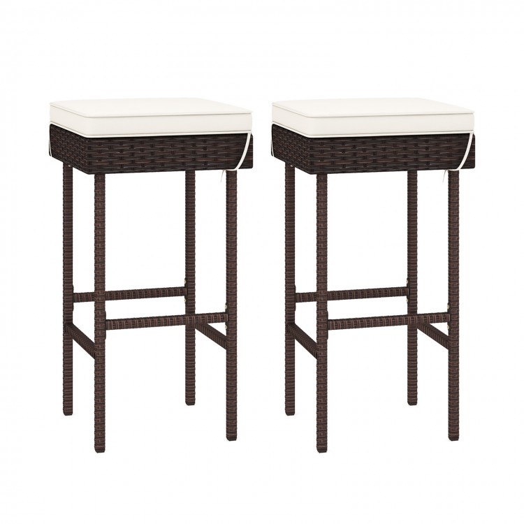 Set of 2 patio rattan barstools with soft cushions and footrests, perfect for backyard or balcony use.